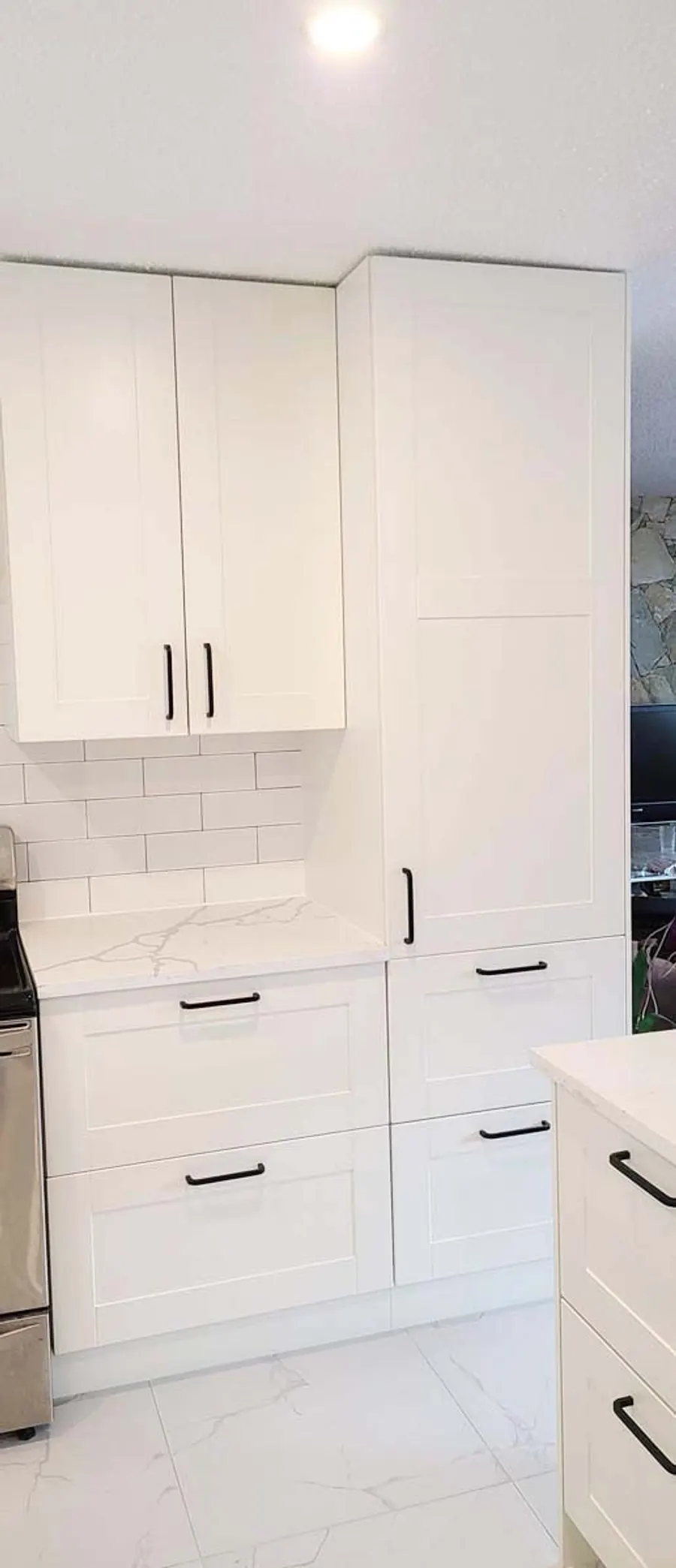 Kitchen renovation with tile backsplash and new countertops, photo 4