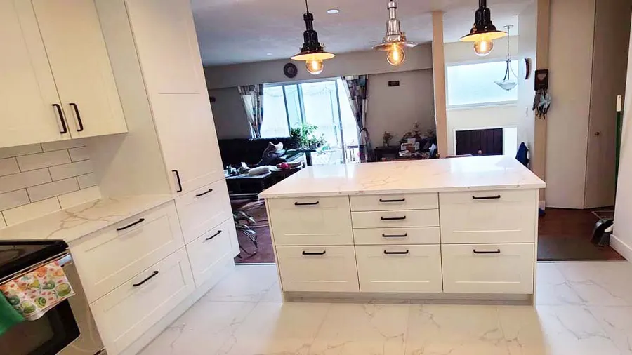 Kitchen renovation with tile backsplash and new countertops, Metro Vancouver