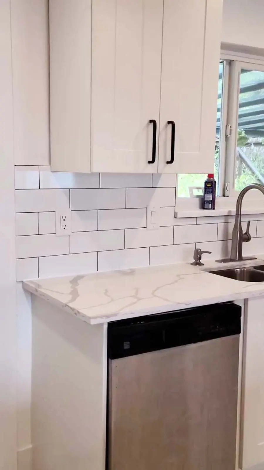 Kitchen renovation with tile backsplash and new countertops, photo 13