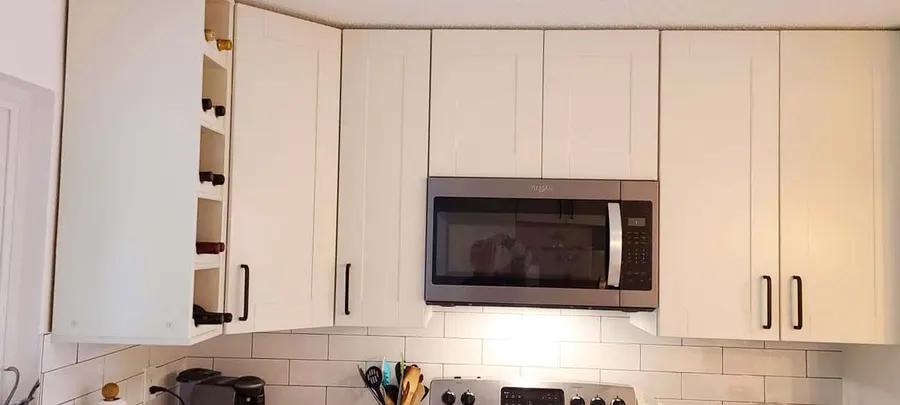 Kitchen renovation with tile backsplash and new countertops, photo 19