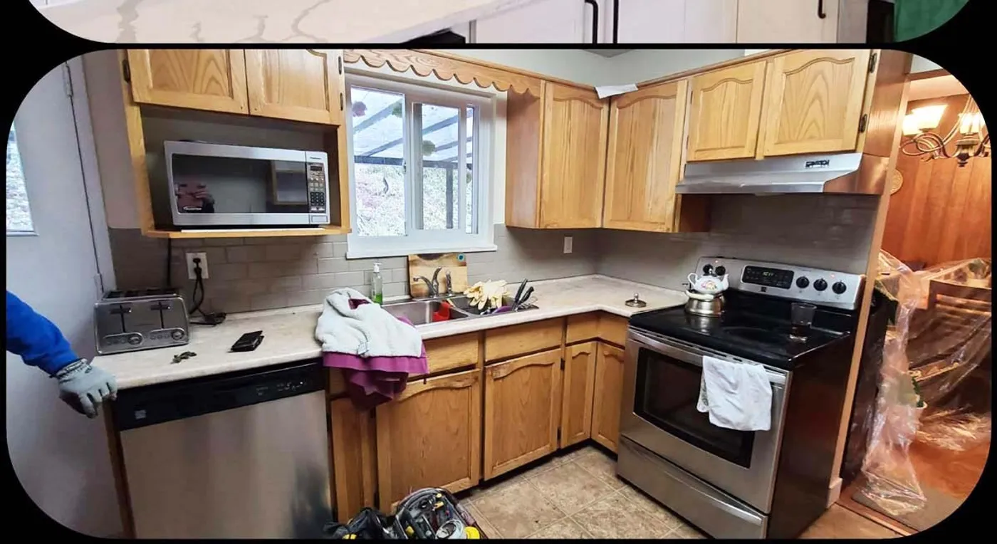 Roham kitchen: from 1980s oak to a white quartz island, Range wall and subway backsplash, after